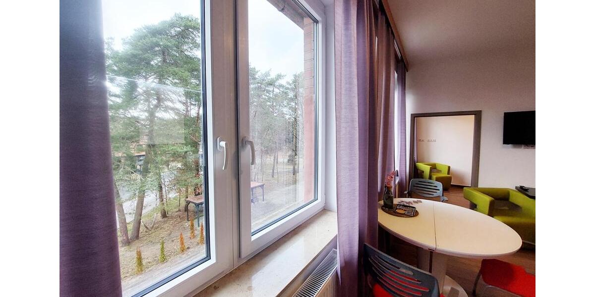 Gemütliche Wohnung mit Küche und Schlafzimmer. 1 zimmer