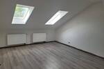 **große Dachgeschoßwohnung**