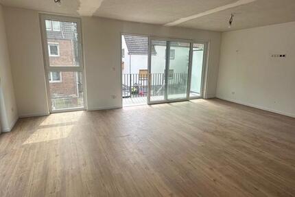 Moderne NeubauWohnung im 1. Obergeschoss – stilvolles Wohnen mit Balkon!