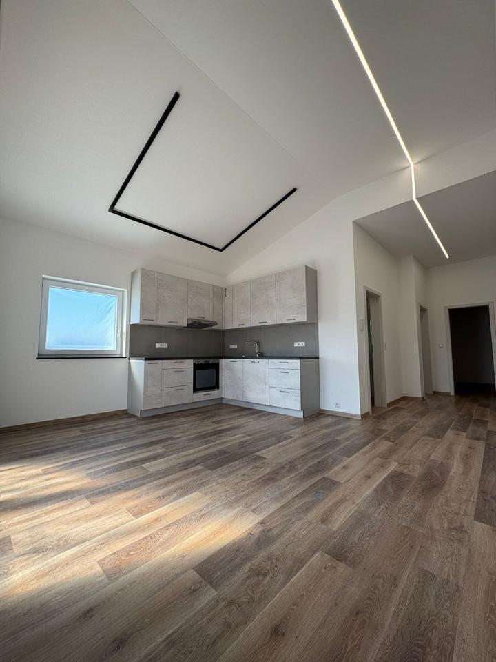 Erstbezug! Stilvolle 3,5-Zi.-DG-Wohnung