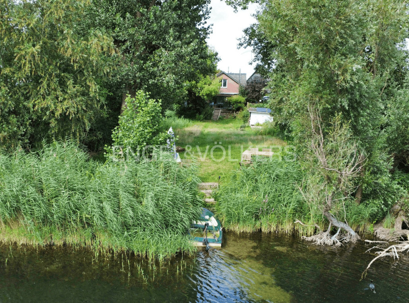 Wohnen am Wasser - Charmantes Einfamilienhaus mit Seezugang und Privatsteg!
