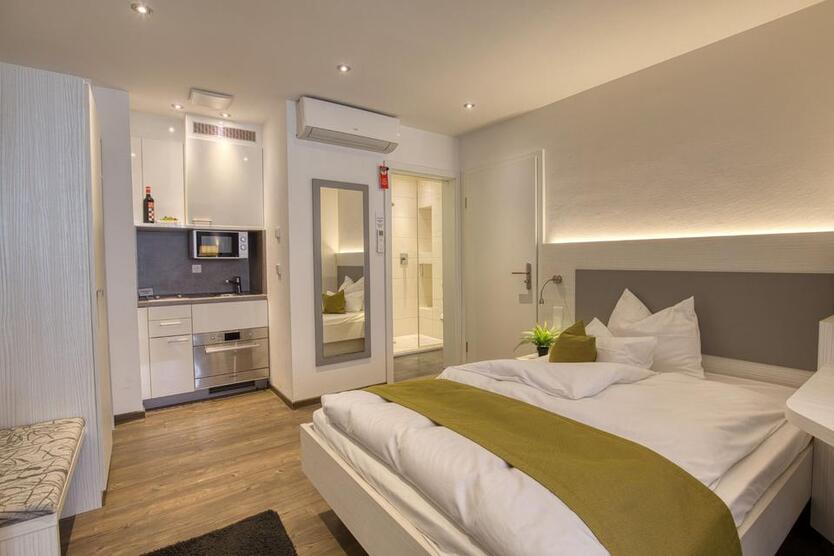 1-Zimmerwohnung (11) mit Internet, Klima, TV, Küchenzeile, DuscheWc, Waschmaschine, Trockner zimmer