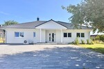 Jetzt Miete möglich! Winkelbungalow 5 km bis Neubrandenburg, Baujahr 2022, Doppelgarage, EBK,Carport - Einfamilienhaus Sponholz | Angebot:25929684