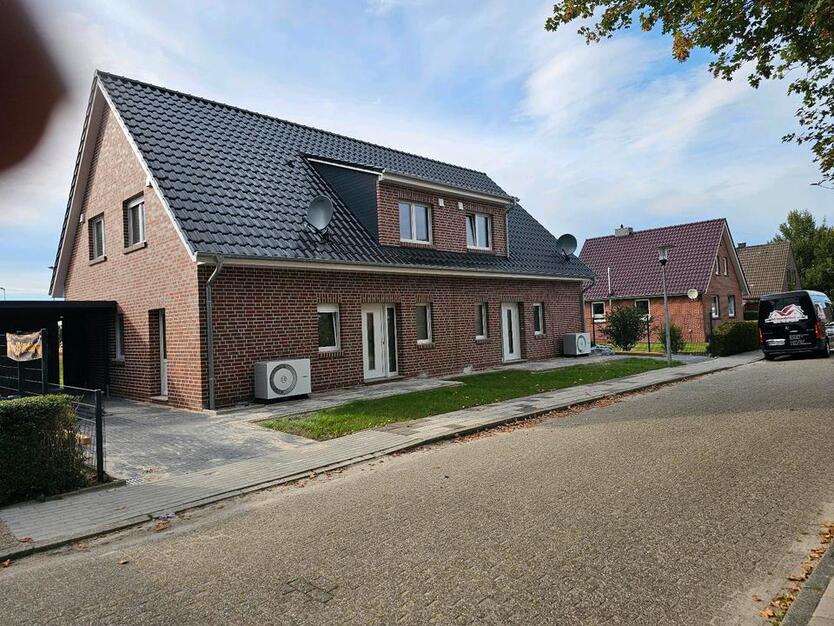 Moderne DHH mit einem Garten in bester Lage in Wittmund