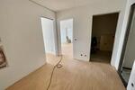 Helle Wohnung BJ 202223 mit Westbalkon, TG-Stellplatz und Stellplatz im Freien!