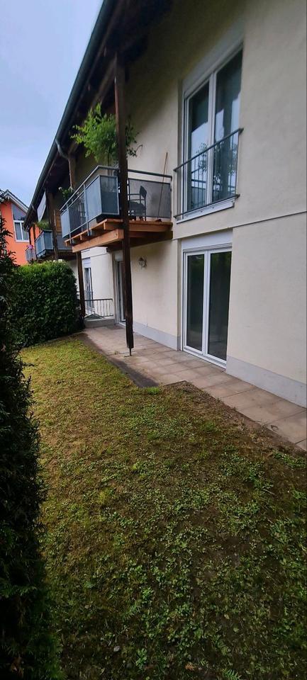 2,5-Zimmer-Erdgeschoss-Wohnung mit Garten und Garage