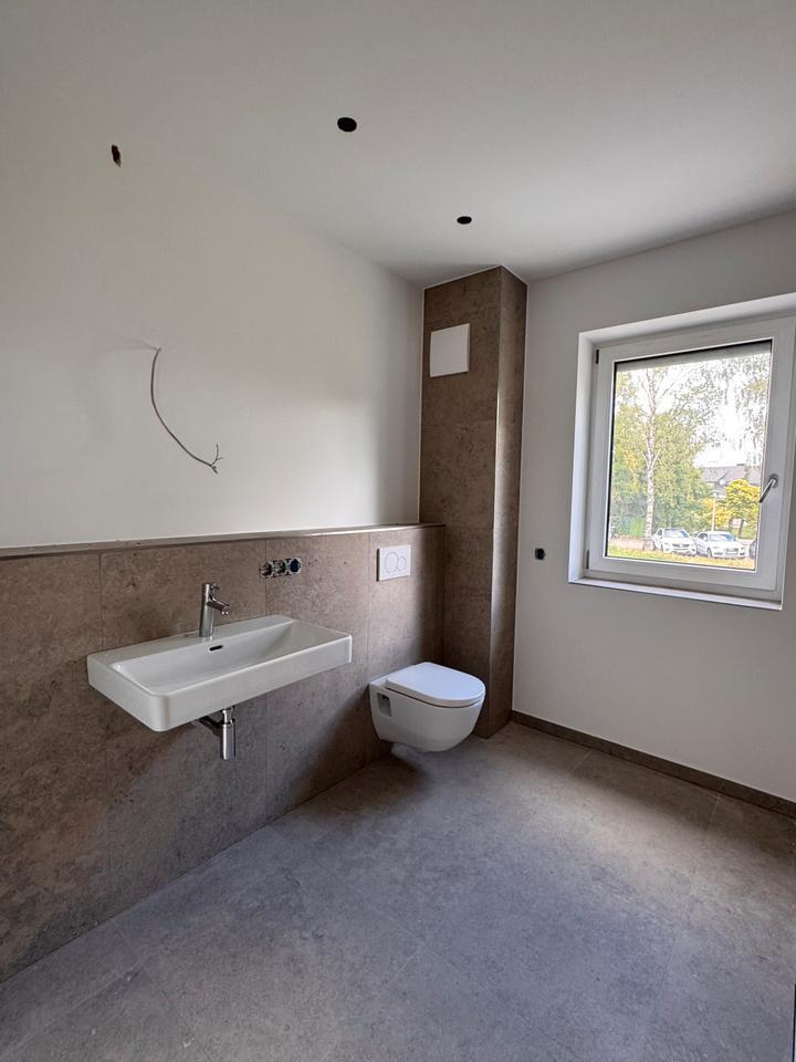 Erstbezug mit Balkon: Schöne, helle 4-Zimmer-Wohnung