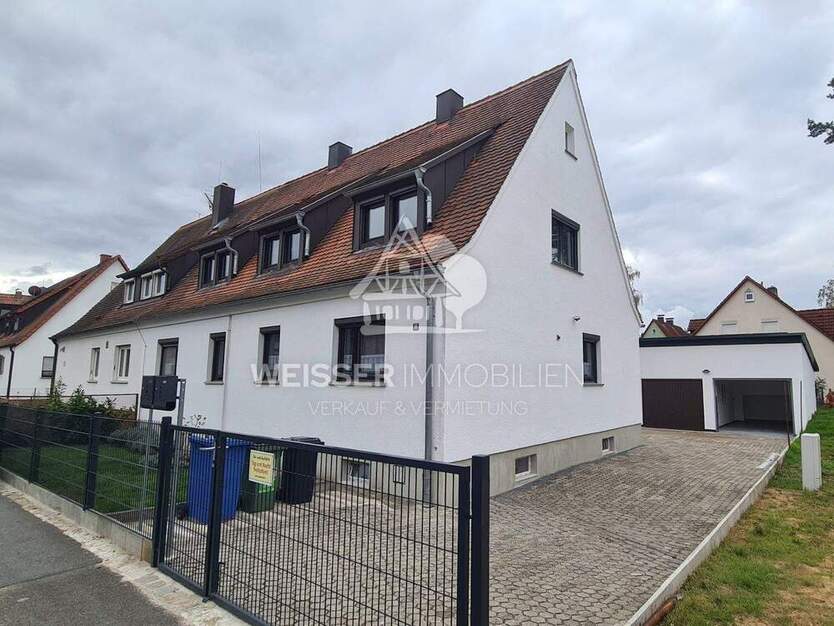 Wohnen mit Hausfeeling: Helle 4-Zimmer-Wohnung mit Garage & Gemeinschaftsterrasse in Fürth-Stadeln 4 zimmer