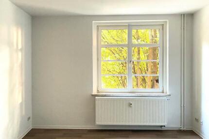 Single-Apartment im denkmalgeschütztem Altbau zimmer