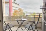 Frisch renovierte teilmöblierte Wohnung – Zentral, praktisch und mit toller Aussicht zimmer