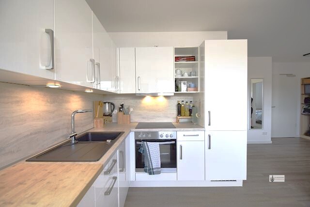 2-Zimmer-OG-Wohnung + 65,80 m² Wohnfläche + Aufzug + Balkon + Carport + EBK kann übernommen werden