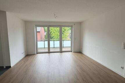Moderne Dachgeschoßwohnung mit Balkon & Garagenstellplatz im Herzen von Harsewinkel