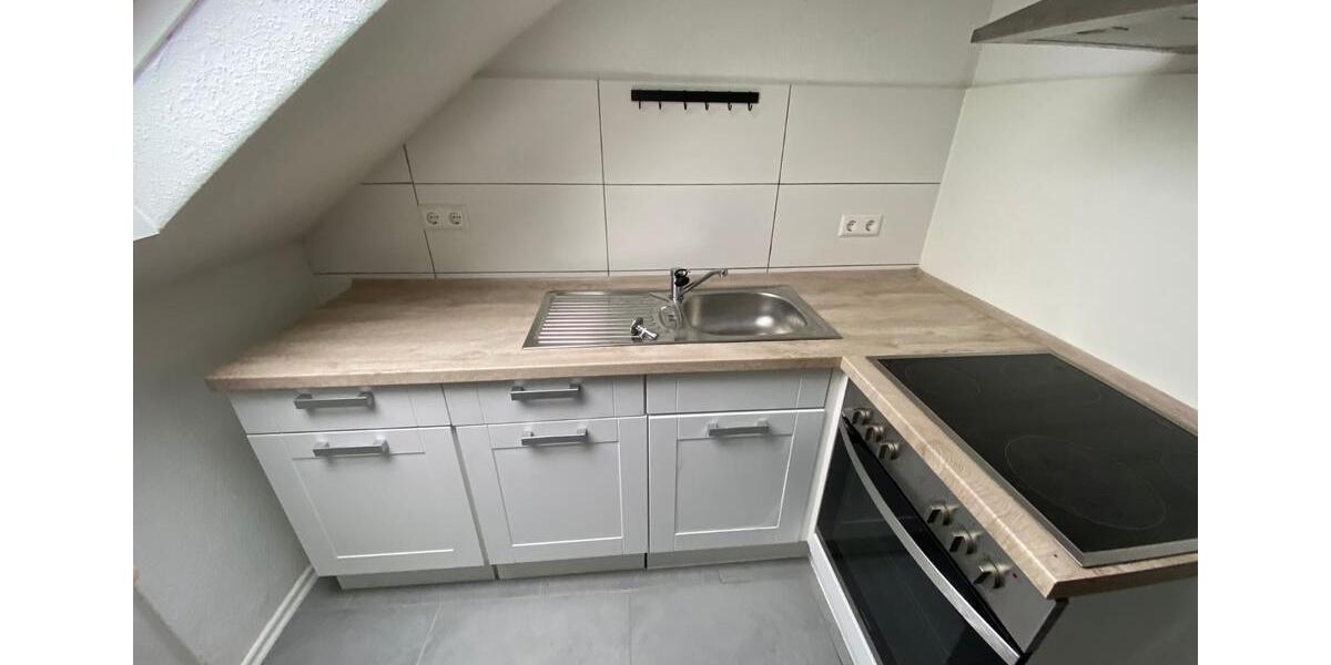 Helle Dachgeschosswohnung in Heddesheim mit Garage – Friedrichstraße 14 2 zimmer