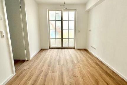 Erstbezug nach Kernsanierung - 2-Zimmer-Wohnung mit Terrasse