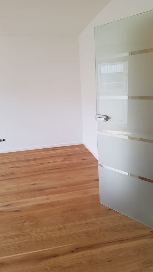 2-Zimmer-Wohnung (mit Wintergarten und Tiefgaragenstellplatz)