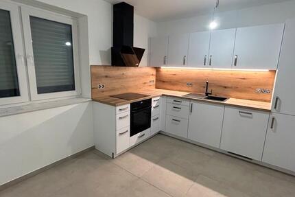 Neubau-Erdgeschosswohnung mit Garten in ruhiger Lage 2 zimmer