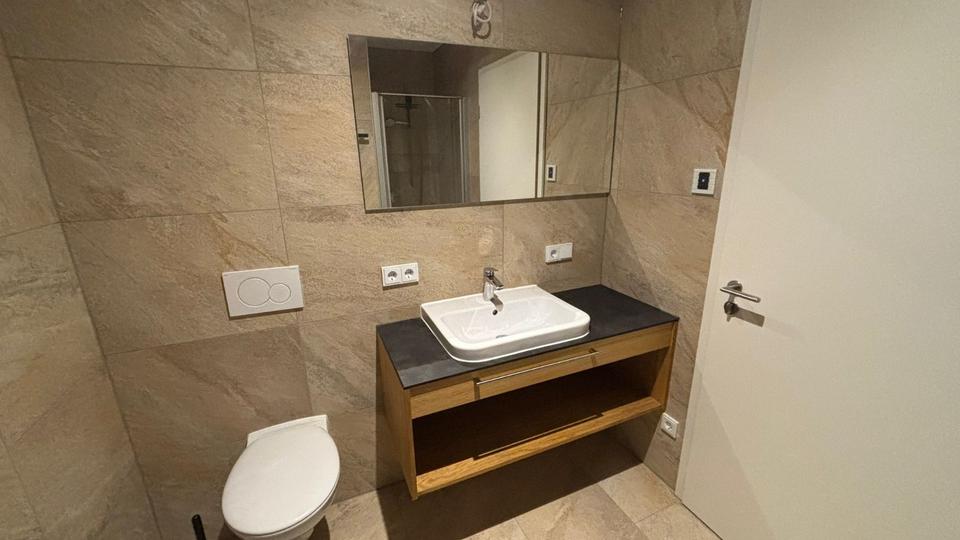 Ab 01.04.: Helle 2-Zi-Whg m. Westterrasse & E-Stellplätzen 2 zimmer