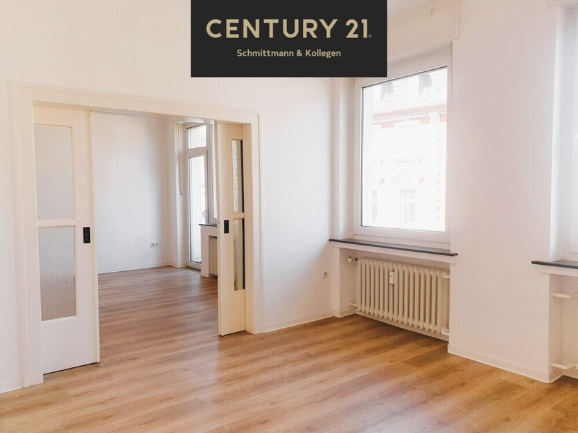 Zentral gelegene charmante Drei-Zimmer-Wohnung mit Balkon