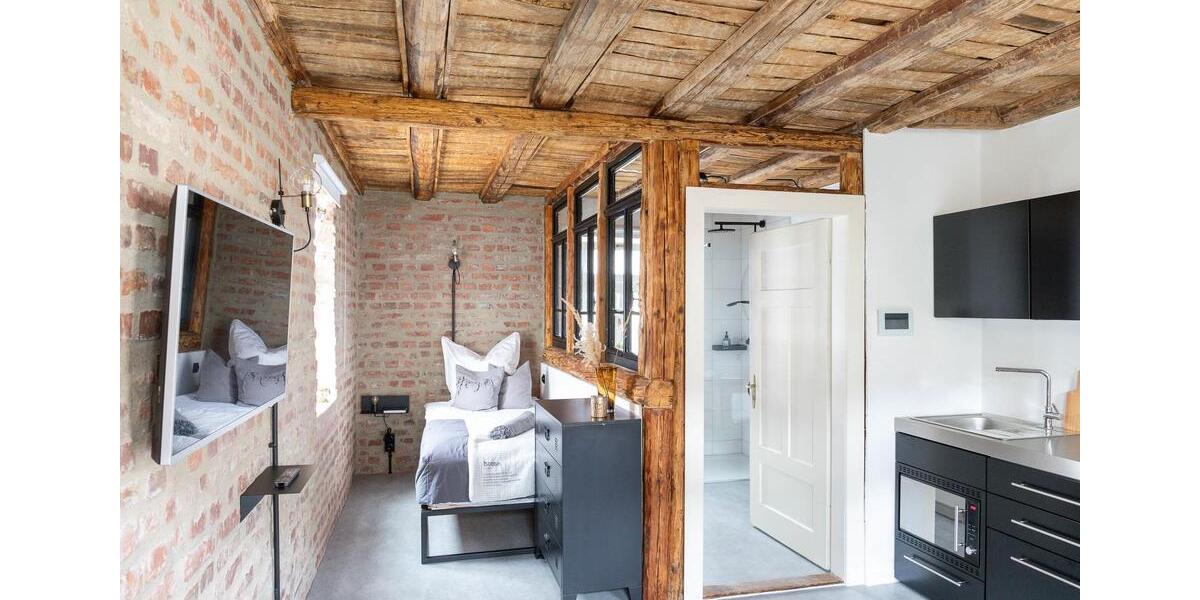 1-Zimmer Studio in Mömbris – unter historischer Spunddecke, voll ausgestattete Pantry-Küche, modernes Bad, Smart-TV, WLAN & Parkplatz 1 zimmer