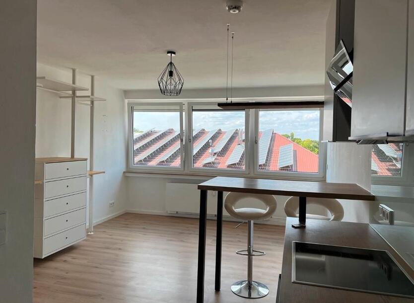 Charmantes 1-Zimmer-Apt. mit Einzelgarage, Einbauküche & Keller