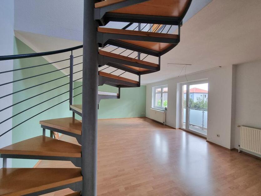 Besondere 3-Zimmer-Maisonette-Wohnung mit Balkon