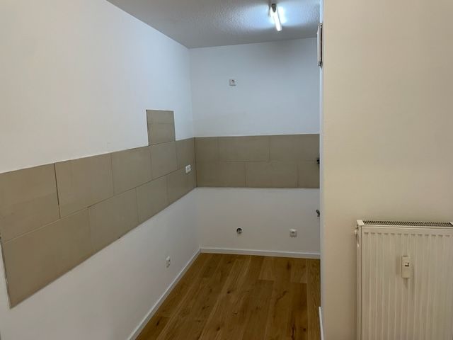 2-Zimmer-Wohnung (mit Wintergarten und Tiefgaragenstellplatz)