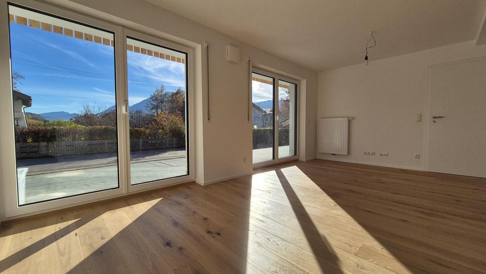 Exklusiver Erstbezug: EG-Wohnung mit wundervollem Erker, riesiger Hochterrasse und Südgarten 3 zimmer