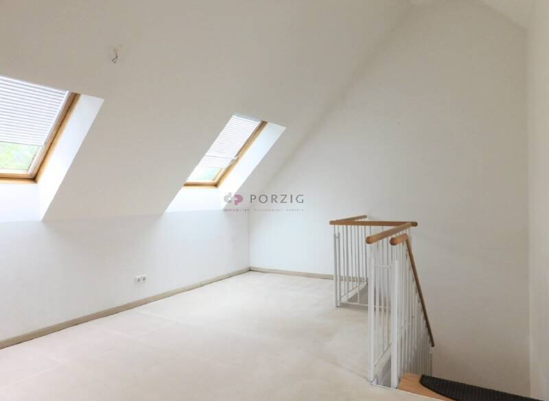 Wohnluxus mit Weitblick - Dachterrasse, Maisonette-Charme & Garage inklusive!