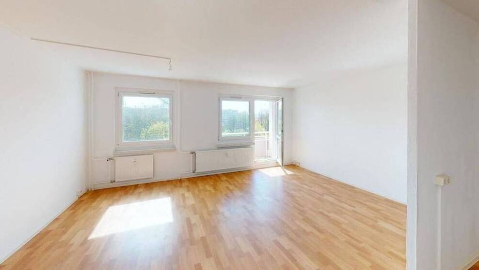 Hier lädt ein offener Wohn-Essbereich zum Wohlfühlen ein