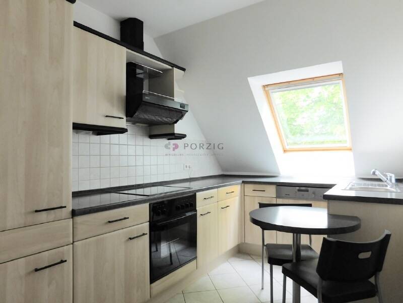 Wohnluxus mit Weitblick - Dachterrasse, Maisonette-Charme & Garage inklusive!