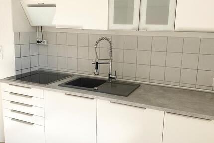 Renovierte Hochparterre Wohnung mit Einbauküche und Garagenstellplatz 4 zimmer