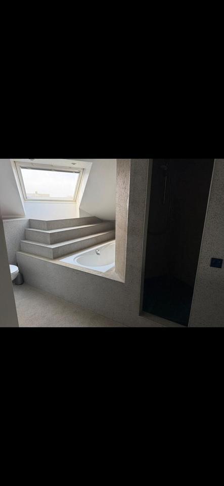 Wohnen mit Wohlfühlfaktor – Dachgeschosswohnung mit Kamin und Ankleidezimmer zimmer