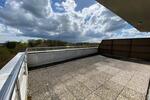 Wohnen mit Weitblick: moderne 1-Zimmer-Wohnung mit großer Dachterrasse