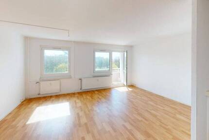 Hier lädt ein offener Wohn-Essbereich zum Wohlfühlen ein