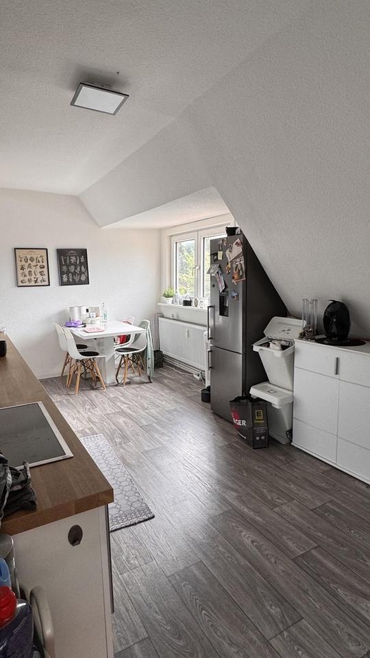 Dachgeschoßwohnung mit Gartenanschluss