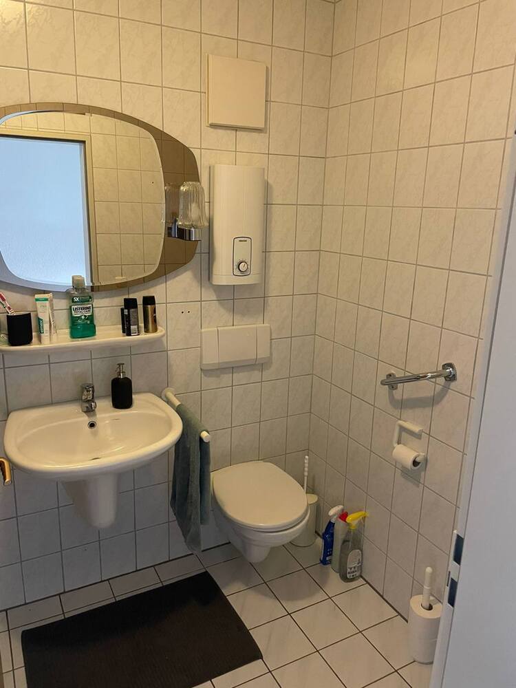 Gemütliche Dachgeschoßwohnung mit Balkon und Carport Stellplatz