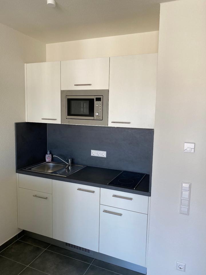 Schönes 1 Zimmer Appartement mit EBK&Loggia im Herzen der Stadt
