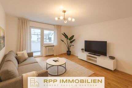 Teilsanierte 2,5-Zimmer-Wohnung mit hochwertiger Ausstattung und Südost-Balkon - Eching 2 zimmer