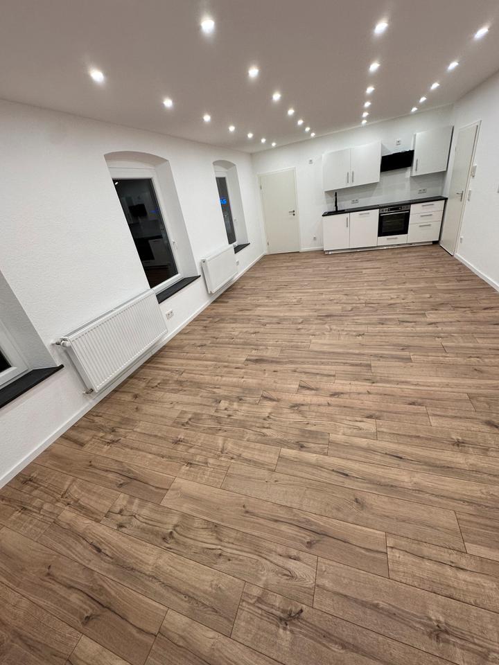 Renovierte, moderne Wohnung mit Gartenzugang zu vermieten
