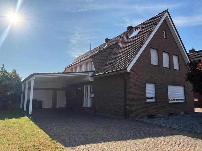 Große, gepflegte 5-Zimmer-Wohnung mit Garten und Garage in 49828 Lage, Dinkel