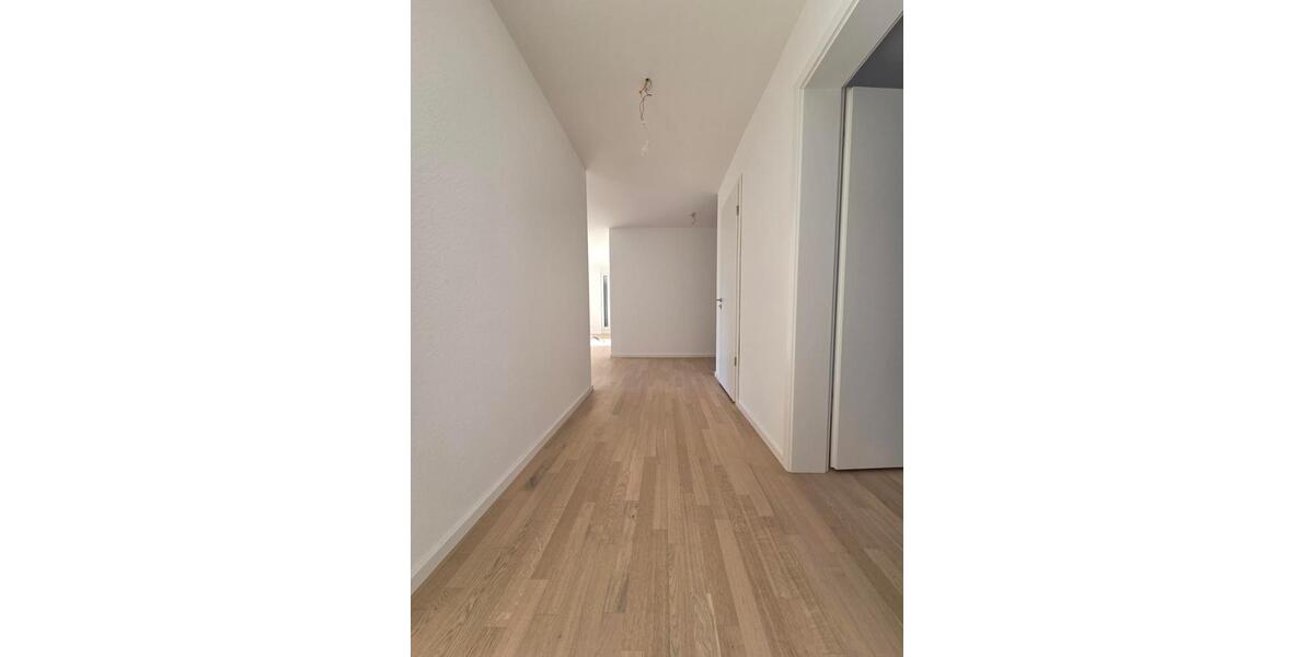 Erstbezug! Exklusive 4-Zimmer-Neubauwohnung, Garten, EBK, TG 4 zimmer