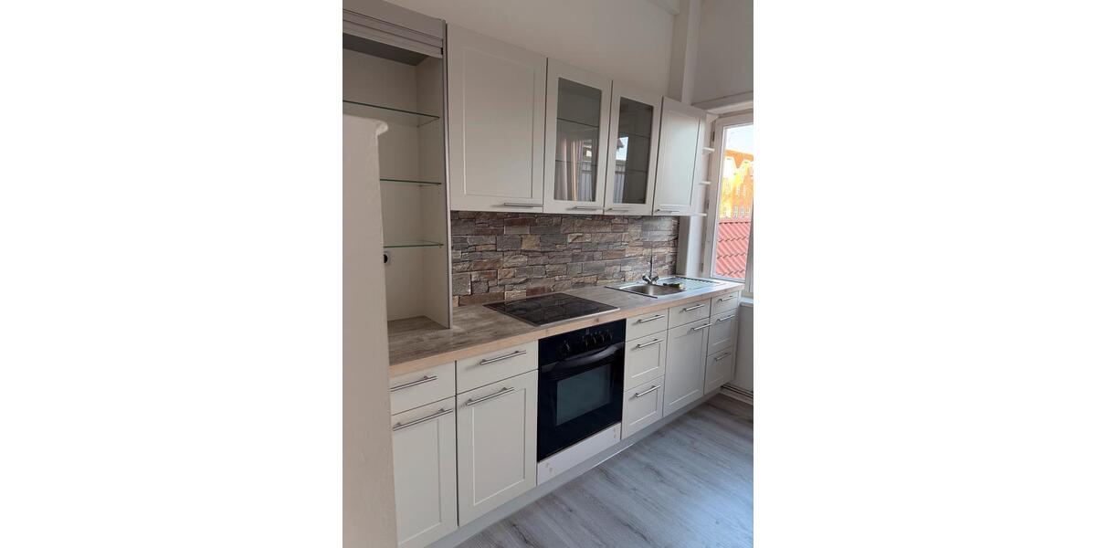 Wohnung im 1. OG in einem Wohn-und Geschäftshaus auch als Büro 4 zimmer