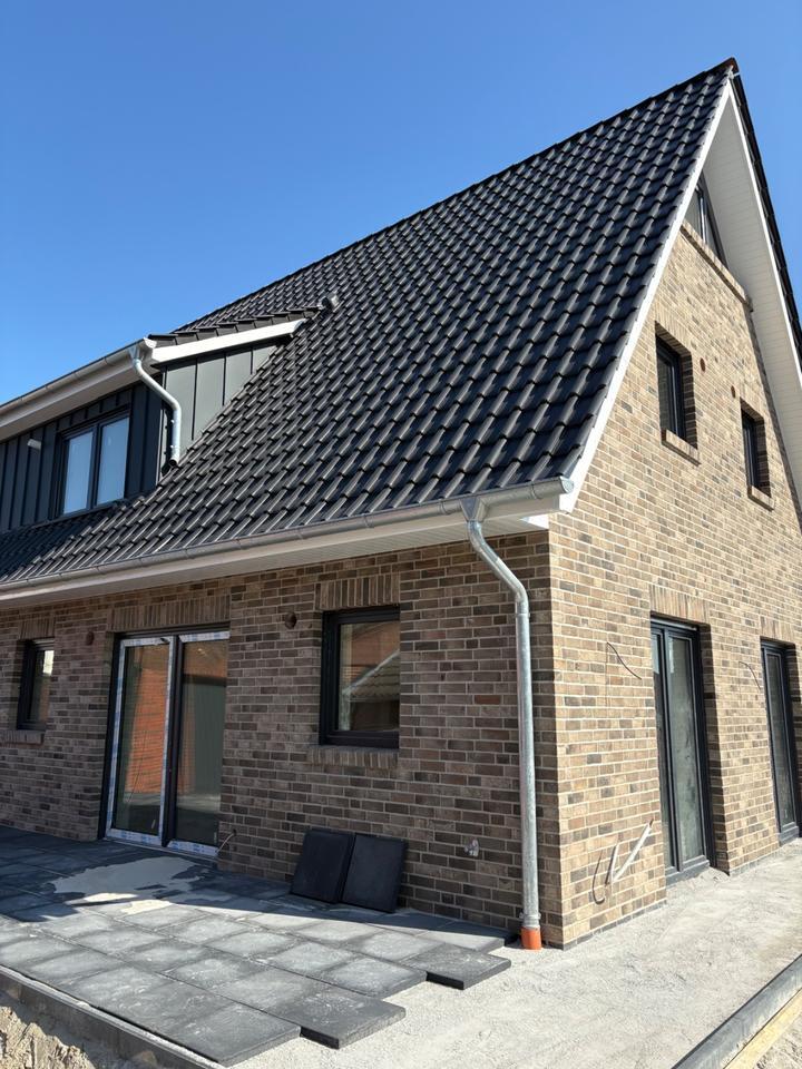 Neubau-Doppelhaushälfte in zentraler Lage in 26180 Rastede