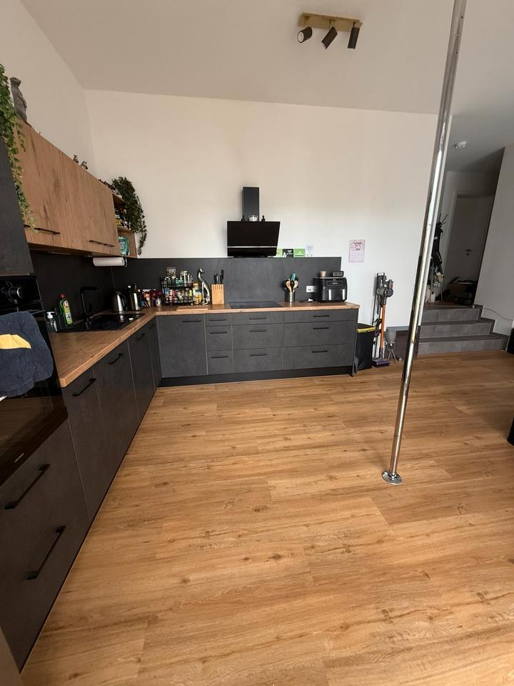 Helle 2-Zimmer-Wohnung mit eigenem Garten & Tiefgarage