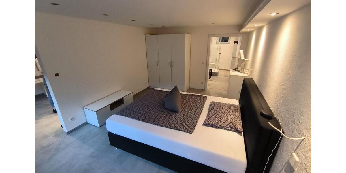 1,5- Zimmerwohnung mit Wlan, TV, Küche, DuscheWC, Waschmaschine, Trockner, Terrasse und Parkplatz 1 zimmer