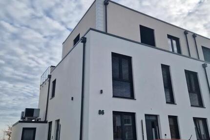 Neubauwohnung mit Einbauküche, Garten & Stellplatz 3 zimmer