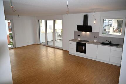 Erstbezug Neubau 2-Zimmerwohnung mit Balkon, Küche, Kellerraum und Tiefgaragenstellplatz 2 zimmer