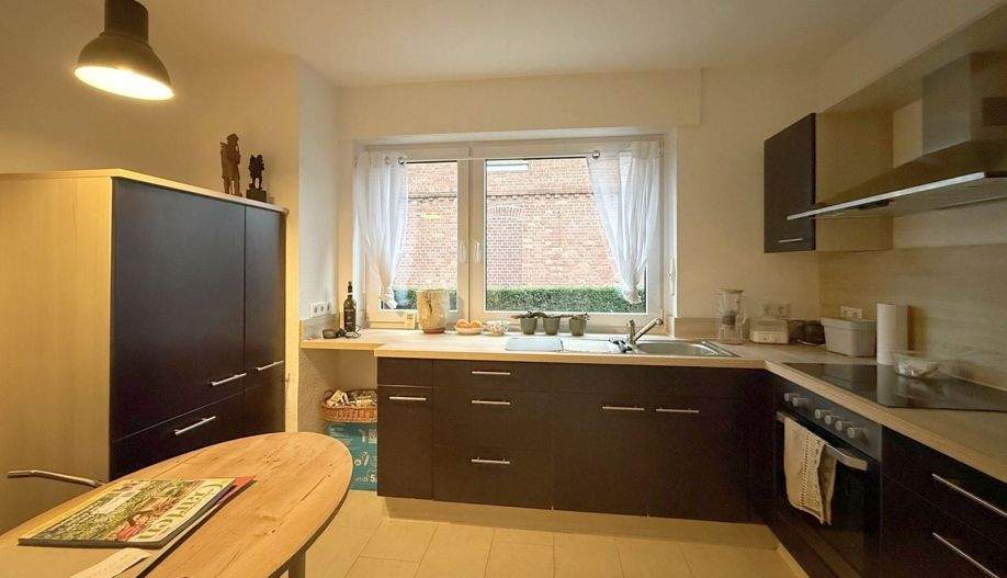 Sanierte 3,5-Zimmer-Erdgeschosswohnung mit Garten und Garage 3 zimmer