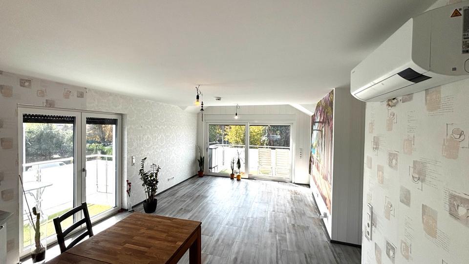 4-Zimmer-Dachgeschosswohnung mit EBK, Aufzug und Klimaanlage zimmer