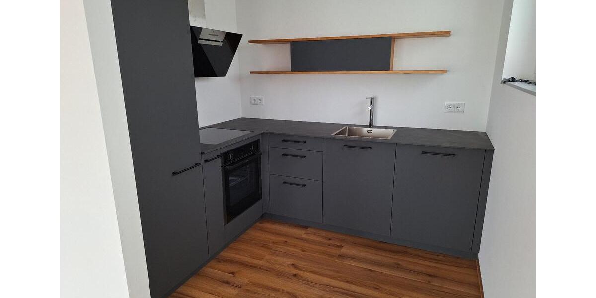 Ab 01.04.: Helle 2-Zi-Whg m. Westterrasse & E-Stellplätzen 2 zimmer